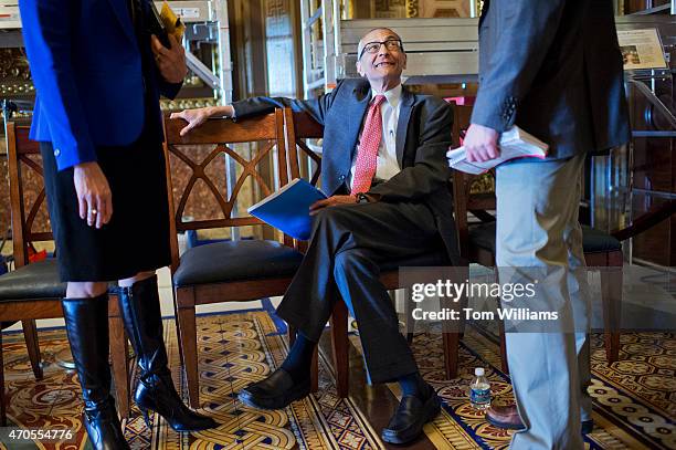 John Podesta, chairman of Hillary Clinton's 2016 presidential campaign, talks with a reporter before the senate policy luncheons in the Capitol,...