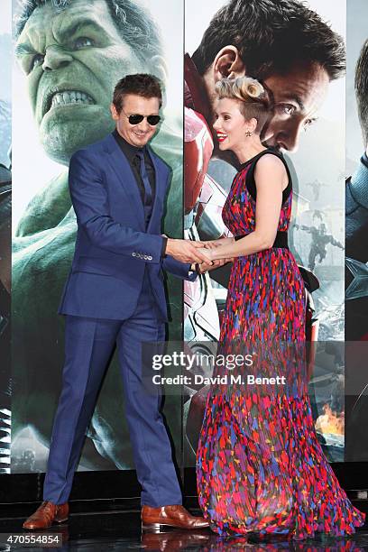 Jeremy Renner and Scarlett Johansson attend the European premiere of "The Avengers: Age Of Ultron" at Westfield London on April 21, 2015 in London,...