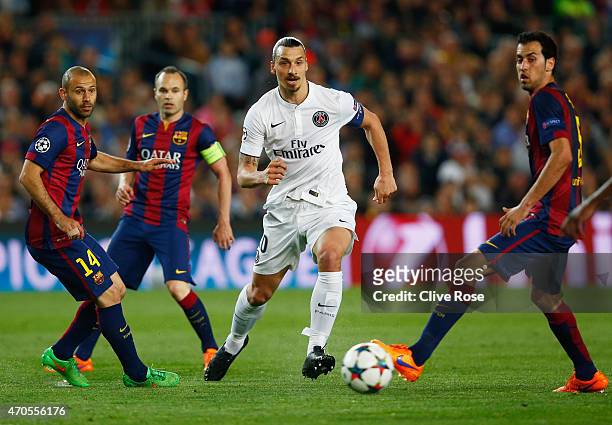 Zlatan Ibrahimovic of PSG takes on Javier Mascherano, Andres Iniesta and Sergio Busquets of Barcelona during the UEFA Champions League Quarter Final...