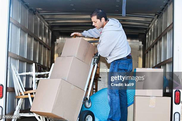 man in moving truck - verhuiswagen stockfoto's en -beelden
