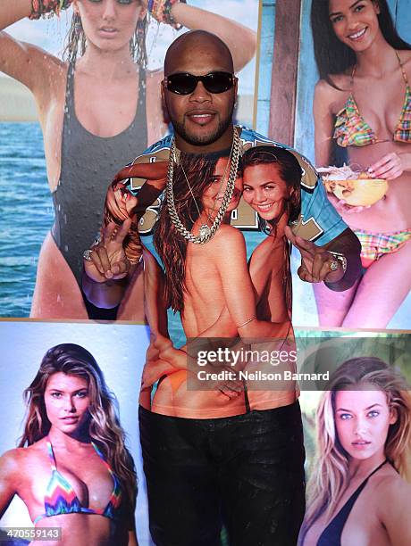 Flo Rida attends Club SI Swimsuit at LIV Nightclub hosted by Sports Illustrated at Fontainebleau Miami on February 19, 2014 in Miami Beach, Florida.
