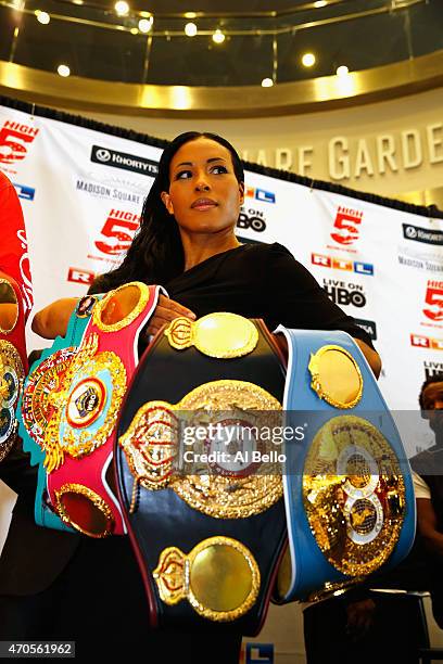 Women's Welterweight Champion Cecilia Braekhus poses with her championship Belts during the Wladimir Klitschko vs Bryant Jennings final press...