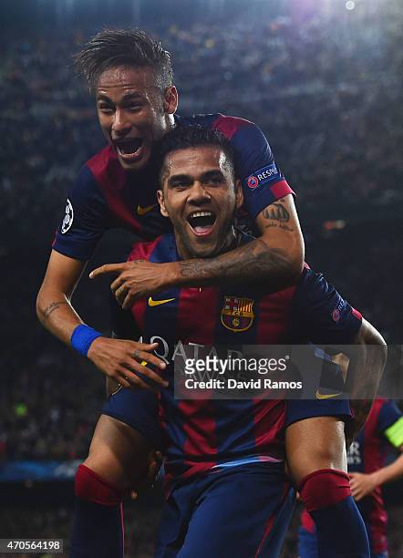 Neymar of Barcelona celebrates with Daniel Alves as he scores their second goal during the UEFA Champions League Quarter Final second leg match...