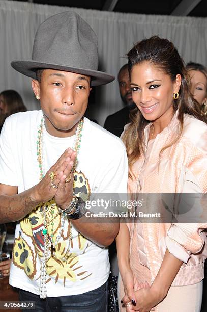 Pharrell Williams and Nicole Scherzinger attend The BRIT Awards 2014 Sony after party on February 19, 2014 in London, England.