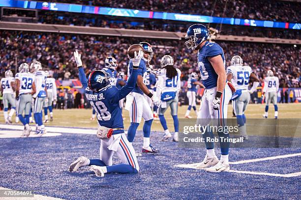 Louis Murphy of the New York Giants shows emotion after scoring a touchdown during the game against the Dallas Cowboys at MetLife Stadium on November...