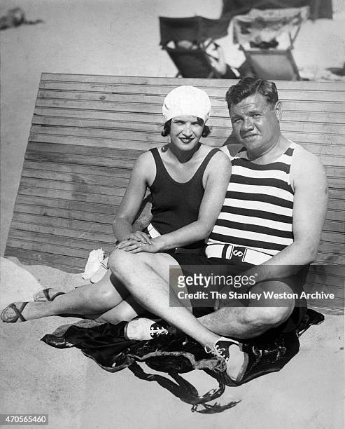 Babe Ruth and his wife Claire get some sun before the Babe reports to spring training on January 30, 1930 at the Sea Spry Beach in Palm Beach,...