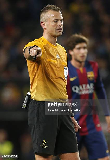 Referee Svein Oddvar Moen of Norway gestures during the UEFA Champions League Quarter Final second leg match between FC Barcelona and Paris...