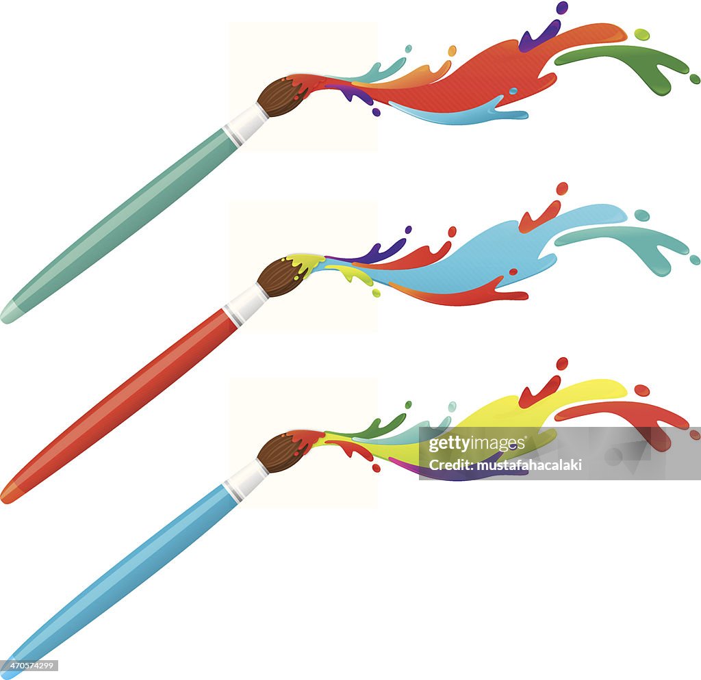 Paint brushes with colourful splatters