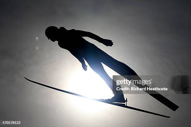 Mario Stecher of Austria competes in the Nordic Combined Men's Team LH during day 13 of the Sochi 2014 Winter Olympics at RusSki Gorki Jumping Center...