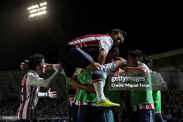 Aldo De Nigris of Chivas celebrates with teammates after scoring during a Championship match between Puebla and Chivas as part of Copa MX Clausura...