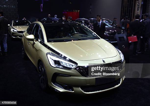 Peugeot Citroen DS5 vehicle stands on display at the 16th Shanghai International Automobile Industry Exhibition in Shanghai, China, on Tuesday, April...