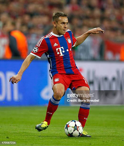 Rafinha of Bayern Muenchen runs with the ball during the UEFA Champions League Quarter Final Second Leg match between FC Bayern Muenchen and FC Porto...