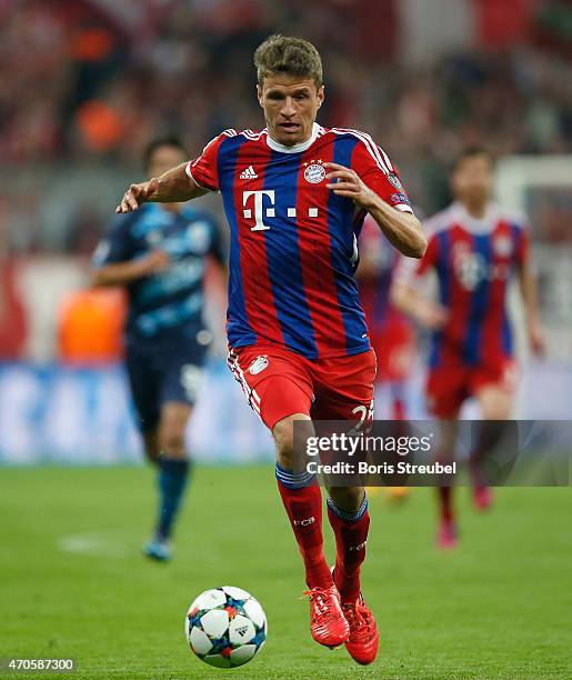 Thomas Mueller of Bayern Muenchen runs with the ball during the UEFA Champions League Quarter Final Second Leg match between FC Bayern Muenchen and...