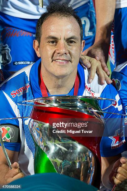 Cuauhtemoc Blanco of Puebla holds the trophy after winning the Championship match between Puebla and Chivas as part of Copa MX Clausura 2015 at...