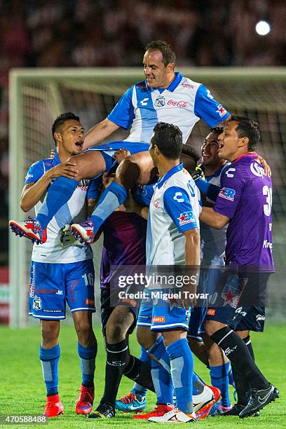 Players of Puebla carry teammate Cuauhtemoc Blanco after winning the Championship match between Puebla and Chivas as part of Copa MX Clausura 2015 at...