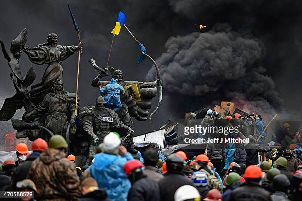 Anti-government protesters continue to clash with police in Independence square, despite a truce agreed between the Ukrainian president and...