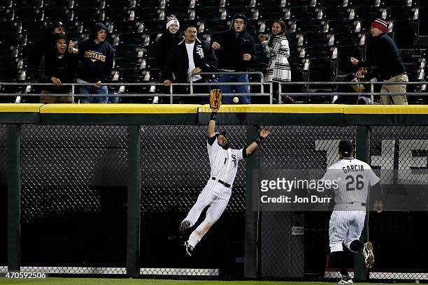 Adam Eaton of the Chicago White Sox is unable to make a leaping catch against the Cleveland Indians during the eighth inning on April 21, 2015 at...