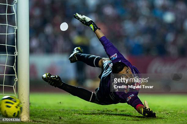 Fabian Villaseñor of Puebla blocks a goal during a Championship match between Puebla and Chivas as part of Copa MX Clausura 2015 at Olimpico...