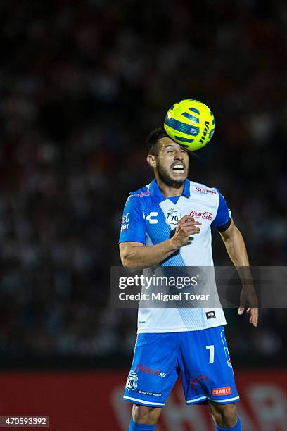 Luis Noriega of Puebla heads the ball during a Championship match between Puebla and Chivas as part of Copa MX Clausura 2015 at Olimpico...