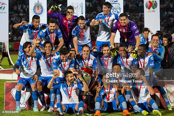 Players of Puebla celebrate after winning the Championship match between Puebla and Chivas as part of Copa MX Clausura 2015 at Olimpico Universitario...