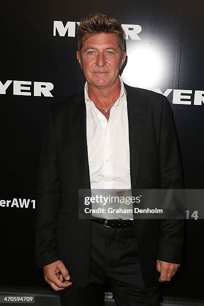 Designer Wayne Cooper arrives at the Myer Autumn Winter 2014 Fashion Launch at Myer Mural Hall on February 20, 2014 in Melbourne, Australia.