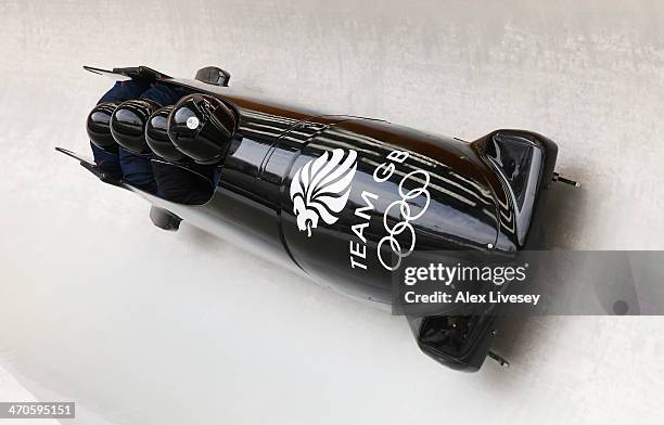 John Jackson, Stuart Benson, Bruce Tasker and Joel Fearon of Great Britain in action during a four-man bobsleigh practice session on Day 13 of the...