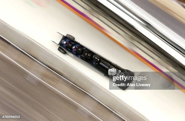 John Jackson, Stuart Benson, Bruce Tasker and Joel Fearon of Great Britain in action during a four-man bobsleigh practice session on Day 13 of the...