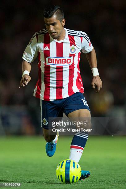 Miguel Ponce of Chivas drives the ball during a Championship match between Puebla and Chivas as part of Copa MX Clausura 2015 at Olimpico...