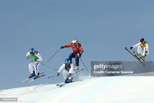 Gold medallist Jean Frederic Chapuis of France leads from silver medallist Arnaud Bovolenta of France, Brady Leman of Canada and bronze medallist...