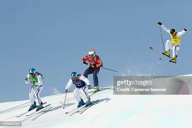 Gold medallist Jean Frederic Chapuis of France leads from silver medallist Arnaud Bovolenta of France, Brady Leman of Canada and bronze medallist...