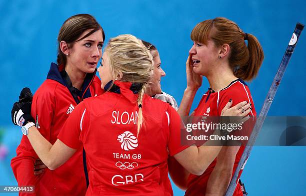 Eve Muirhead, Anna Sloan, Vicki Adams and Claire Hamilton of Great Britain celebrate as they win the bronze medal during the Bronze medal match...