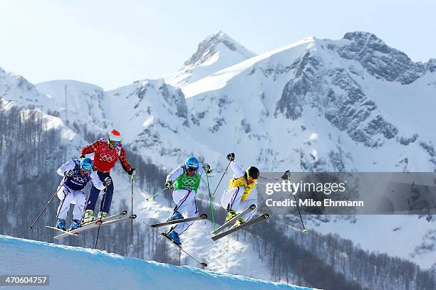 Gold medallist Jean Frederic Chapuis of France leads from silver medallist Arnaud Bovolenta of France , Brady Leman of Canada and bronze medallist...