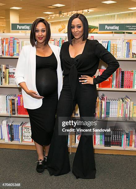 Tamera Mowry and Tia Mowry sign and discuss their new book "Twintuition" at Barnes & Noble bookstore at The Grove on April 21, 2015 in Los Angeles,...