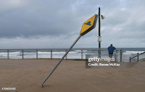 Sand washes up on to the Cronulla Esplanade on April 22, 2015 in Sydney, Australia. Three people have died and more than 200,000 are still without...