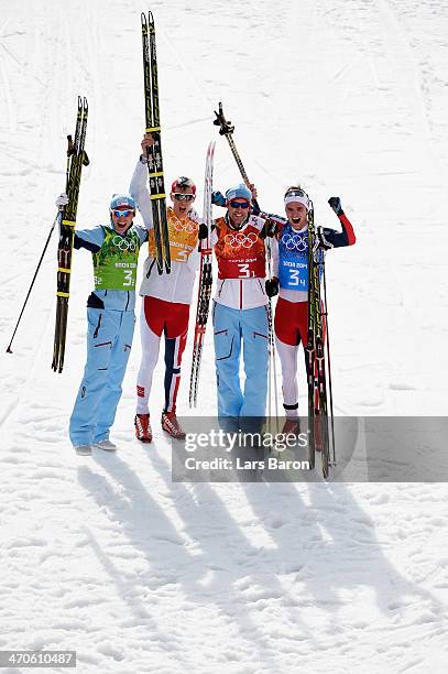 Gold medalists Magnus Hovdal Moan , Haavard Klemetsen , Magnus Krog and Joergen Graabak of Norway celebrate after the Nordic Combined Men's Team 4 x...