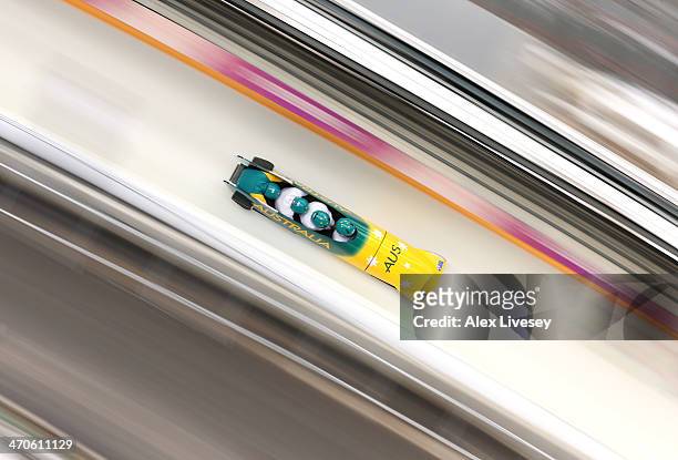 Heath Spence of Australia pilots a run during a four-man bobsleigh practice session on Day 13 of the Sochi 2014 Winter Olympics at Sliding Center...