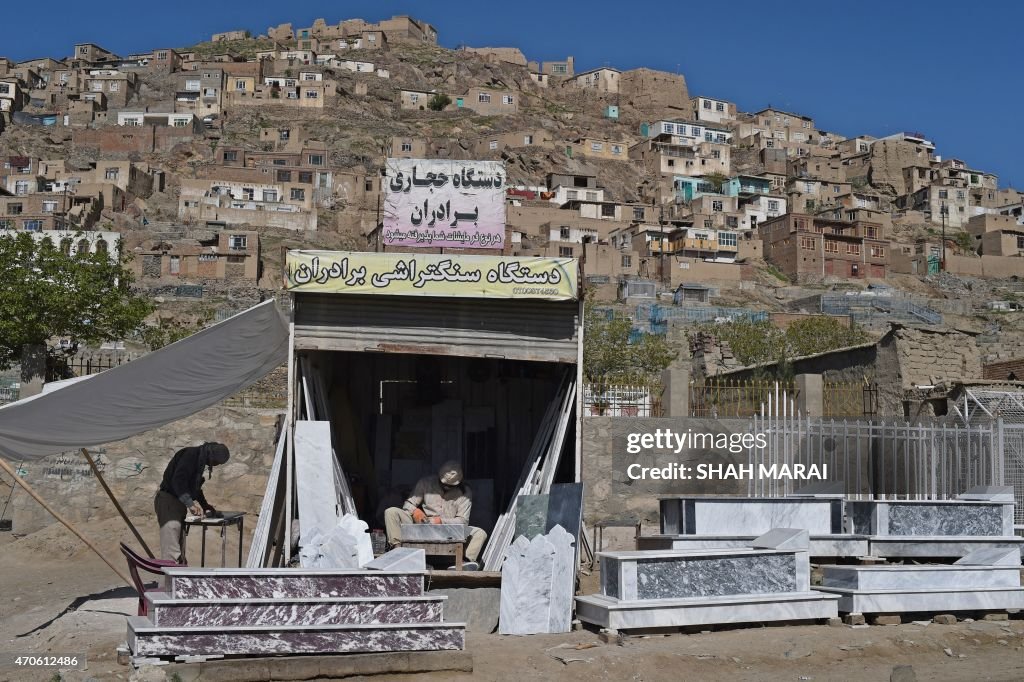 AFGHANISTAN-UNREST-BURIAL-TOMBSTONES