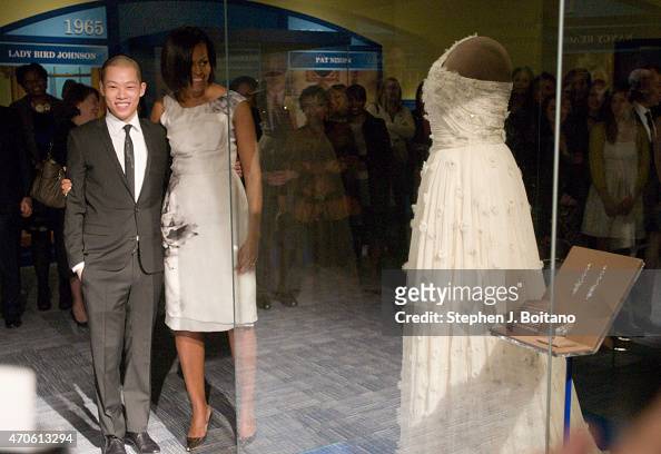 Michelle Obama shows designer Jason Wu the inaugural gown she wore to ...