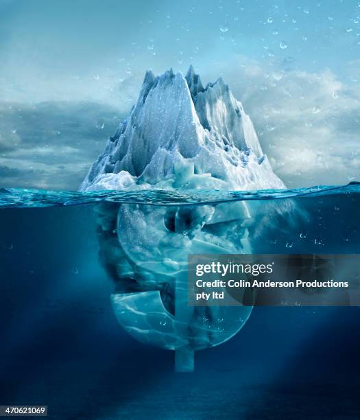 dollar sign under floating glacier - image manipulation stock pictures, royalty-free photos & images