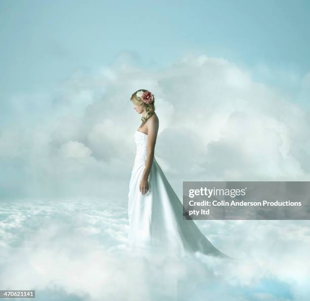 caucasian bride in clouds - budding starlets stock pictures, royalty-free photos & images