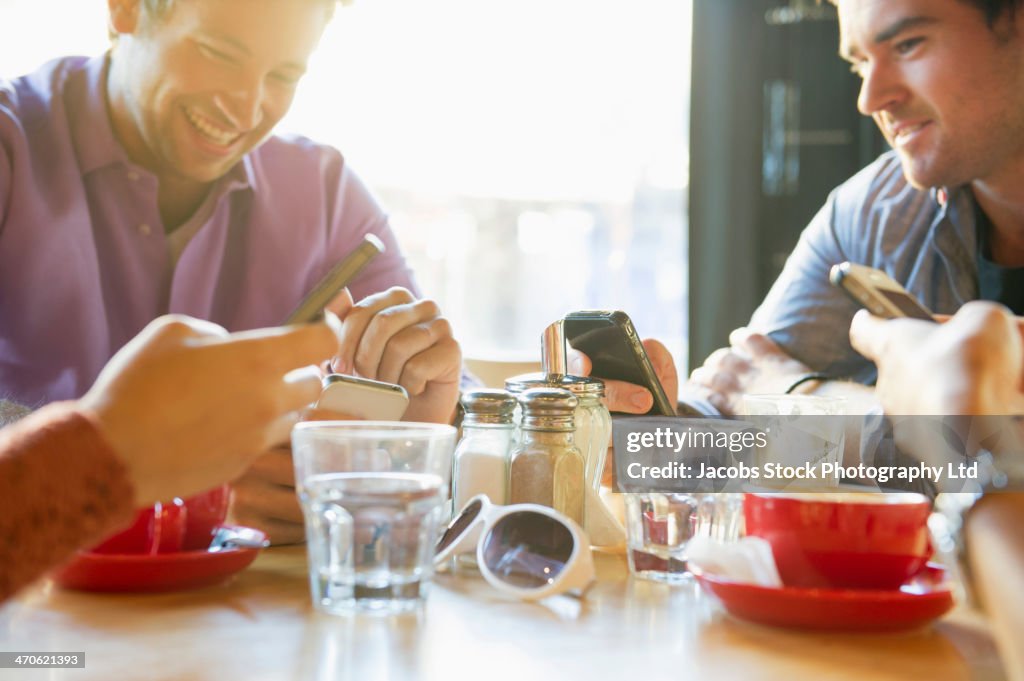 Friends having coffee in cafe