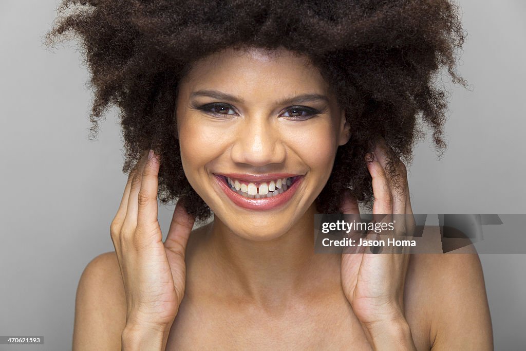 Mixed race woman smiling