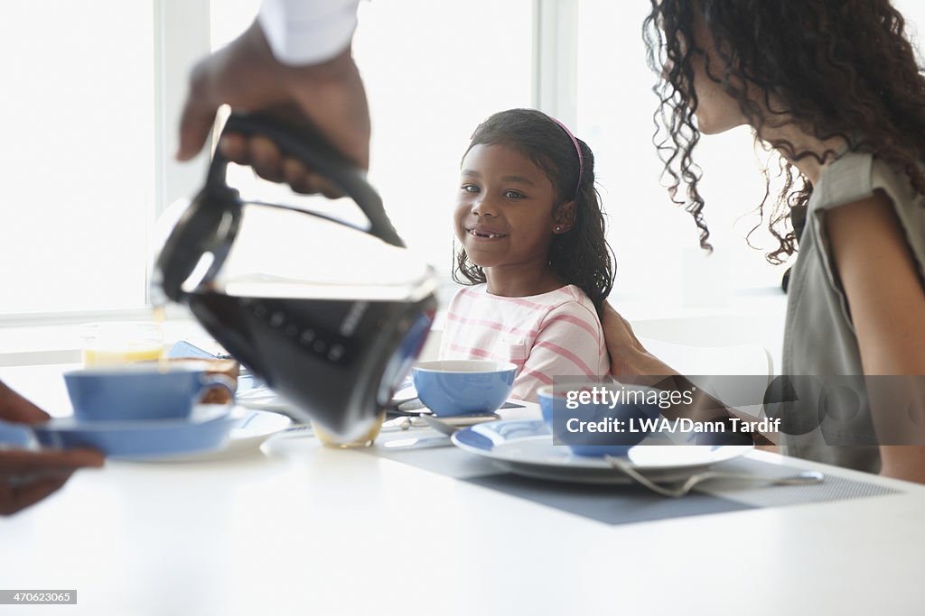 Family at breakfast table