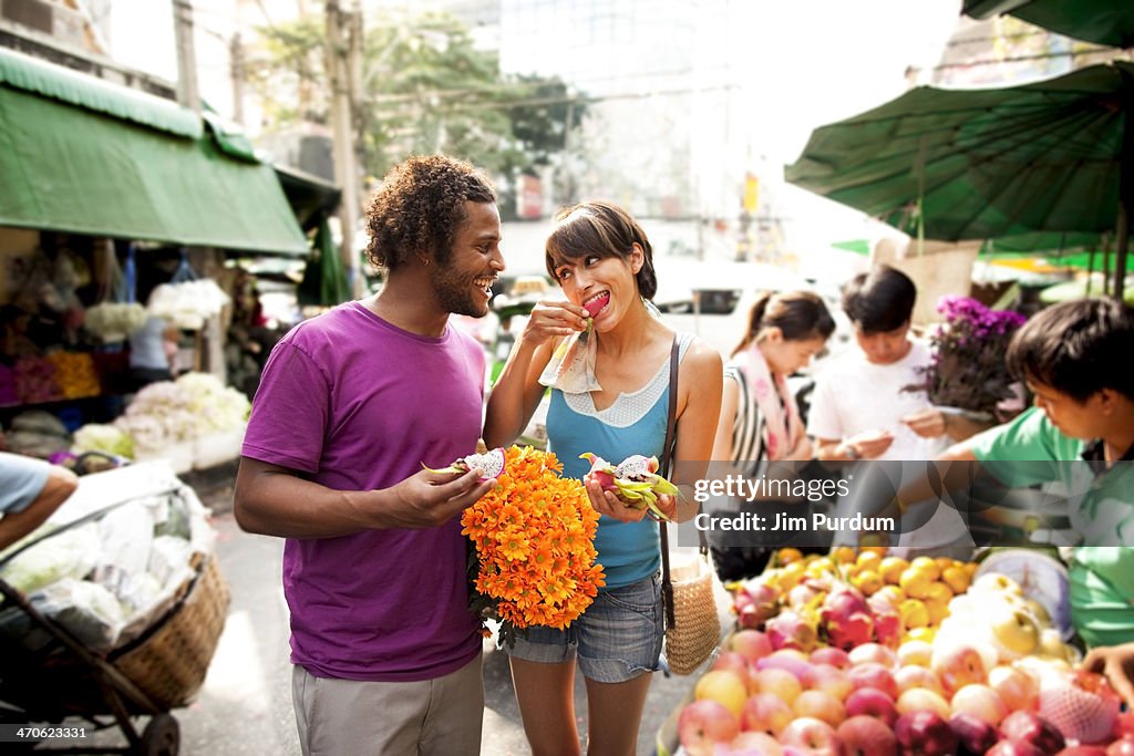Couple shopping in outdoor market, Bangkok, Bangkok, Thailand