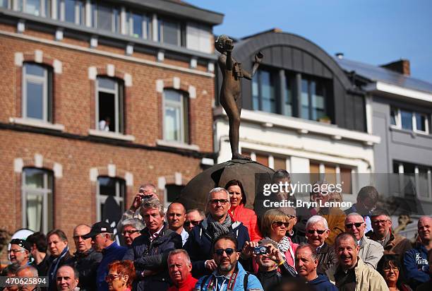 Spectators wait at the race start in Waremme during the 79th La Fleche Wallonne from Waremme to Huy on April 22, 2015 in Huy, Belgium.