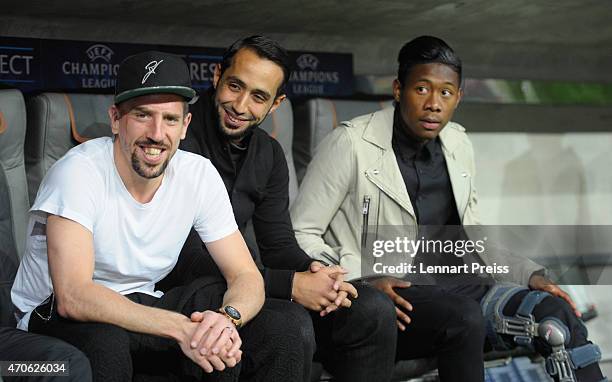 Injured players Franck Ribery , Medhi Benatia and David Alaba of Munich sit on the bench prior to the UEFA Champions League quarter final second leg...