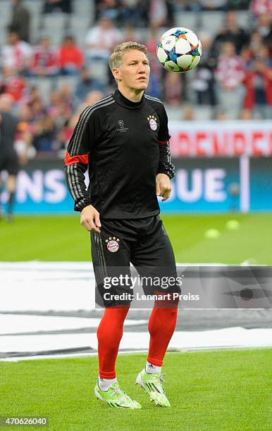 Bastian Schweinsteiger of Munich warms up prior to the UEFA Champions League quarter final second leg match between FC Bayern Muenchen and FC Porto...