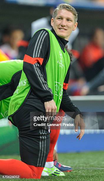 Bastian Schweinsteiger of Munich warms up during the UEFA Champions League quarter final second leg match between FC Bayern Muenchen and FC Porto at...