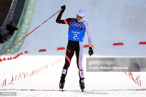 Mario Stecher of Austria competes in the Nordic Combined Men's Team 4 x 5 km during day 13 of the Sochi 2014 Winter Olympics at RusSki Gorki Jumping...