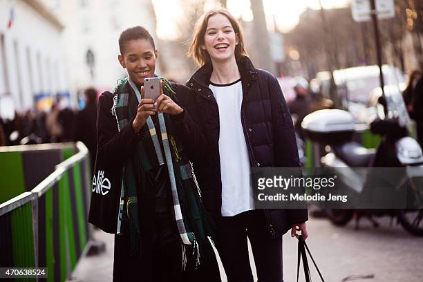 Models Ysaunny Brito and Alexandra Hochguertel exit the Barbara Bui show at Palais de Tokyo on Day 3 of Paris Fashion Week FW15 on March 5, 2015 in...